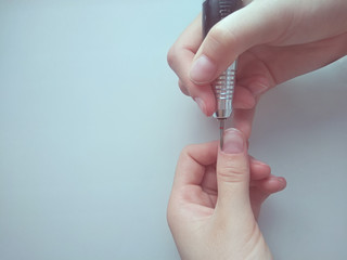 The manicure master processes the cuticle to the client. Tool for nails. Cuticle treatment and...