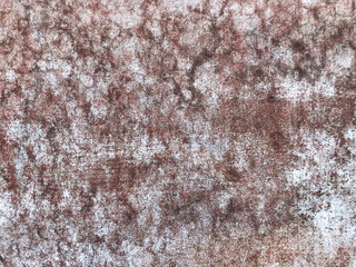 Texture of iron metal painted bright paint peeling paint old battered scratched cracked ancient rusty metal sheet wall with corrosion. The background.