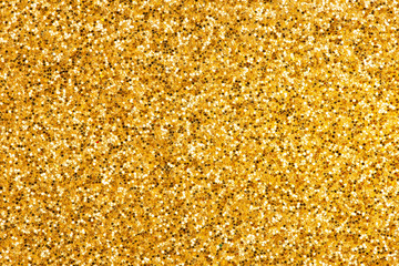 Shiny yellow gold glitter textured empty christmas card, party or happy new year background with copy space