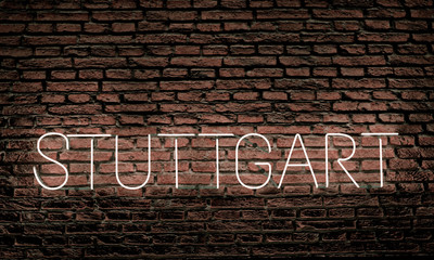 Stuttgart neon sign brick wall