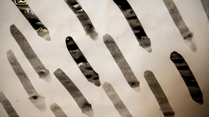Black signs hand-drawn with gouache and brush.