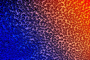 abstract pattern of pure water drop above surface of Phantom blue and Lush lava color background