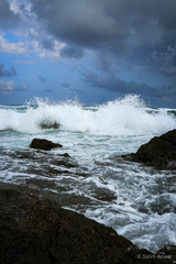 waves crashing on rocks