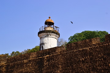 Old colonial lighthouse and old fortress wall of Tellicherry Fort (Thalassery Fort), Thalassery, Kerala, India