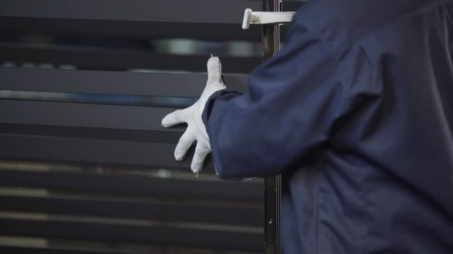 Coloured Aluminum profiles after anodizing process in the factory. Electrolytic passivation process to increase the thickness of natural oxide layer on the surface of metal parts.