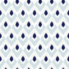 Ikat seamless geometric pattern. Abstract background texture.Pattern can be used for wallpaper and textile, pattern fills, web page background, surface textures.