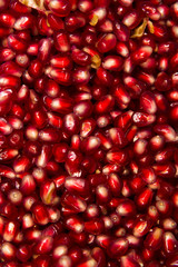 Fresh pommegranate grains backdrop