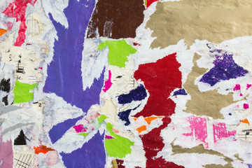 Old dirty torn and peeling paper posters and placards texture background.