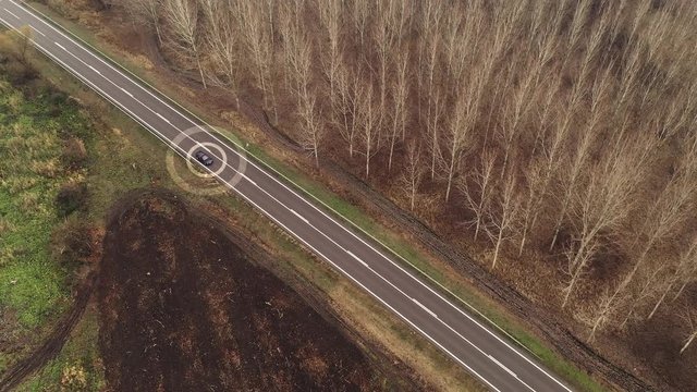 Driverless car autonomous vehicle on road, aerial view
