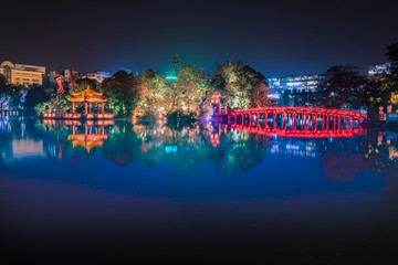 Red bridge in Hoan Kiem lake, Ha Noi, Vietnam, landmark, traveling, scenery. © May Chanikran