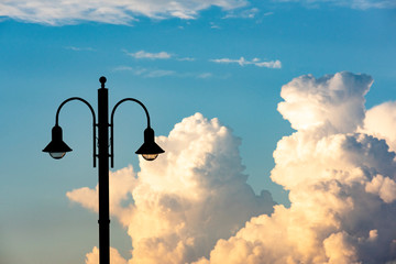 street lamps with a background of a spectacular sky