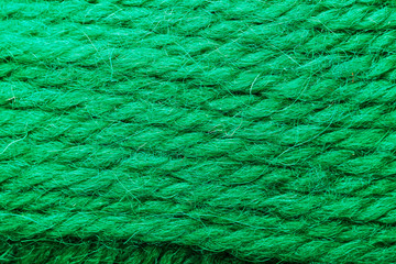 Wool yarn close up colorful aquamarine threads for needlework in macro.