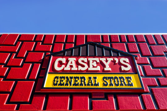 Larned, USA - October 14, 2019: Small town in Kansas with exterior closeup of sign on building for Casey's General Store