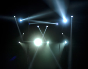Bright beautiful rays of light on an stage before the concert.