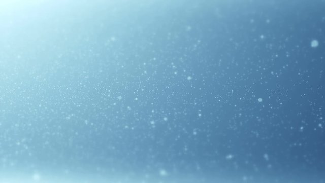 Abstract dust particles flowing in blue light. Seamless loop 4K