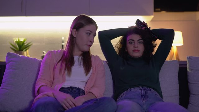 Female Roommates Arguing About Tv Program, Conflict Between Friends, Bad Mood