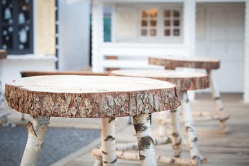 Rustic table and chairs made from tree trunks