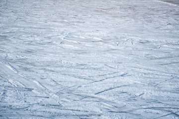 Blue ice with skate scratches