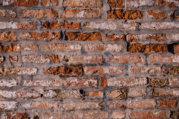 Red old brick wall texture loft grunge background. Italian masonry