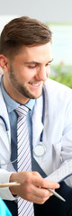 Fototapeta premium Smiling doctor getting good news