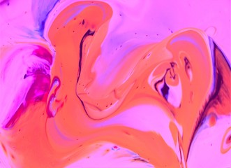 Orange-pink abstract background. Bright colors flow freely and create an interesting structure....