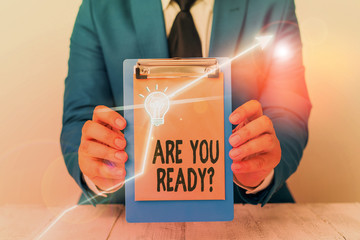 Writing note showing Are You Ready Question. Business concept for used telling someone start something when feel prepared