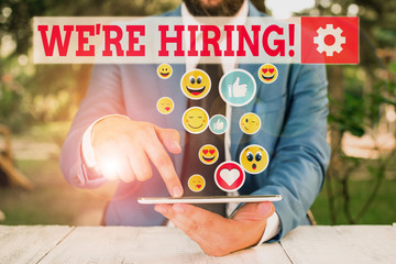 Conceptual hand writing showing We Re Hiring. Concept meaning recently employ someone or pay...