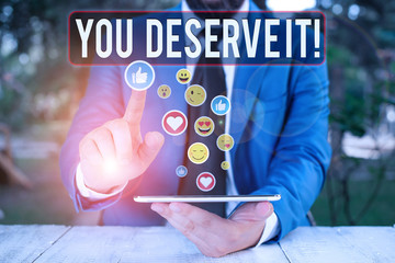 Writing note showing You Deserve It. Business concept for should have it because of their qualities...