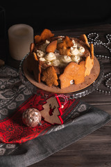 Homemade New Year's cherry cake in New Year's entourage