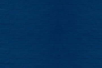 Trendy color painted classic blue brick wall texture wallpaper background.