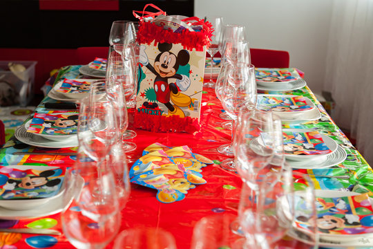 alladolid, Castilla y Le&oacute;n / Spain: April 21, 2013: Table set for children's birthday celebration, decorated with motifs inspired by Mickey and the Disney world