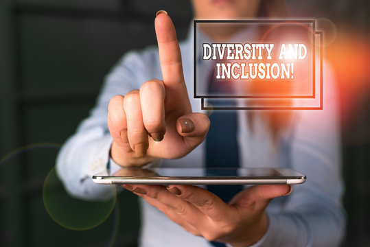 Word writing text Diversity And Inclusion. Business photo showcasing range huanalysis difference includes race ethnicity gender Blurred woman in the background pointing with finger in empty space