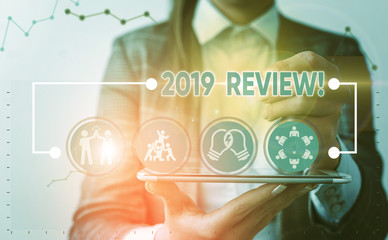 Writing note showing 2019 Review. Business concept for remembering past year events main actions or good shows