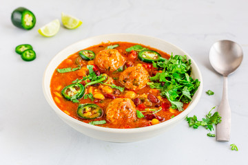 Hot Soup with Meatballs and vegetables in a Bowl on the Table. Winter Food, Albondigas Soup,...