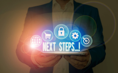 Text sign showing Next Steps. Business photo showcasing something you do after you have finished doing first one