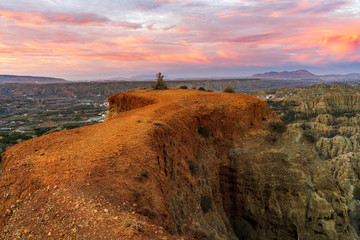 Stormy badlands landscape in Purullena. Guadix region. Province of Granada. Andalusia. South Spain