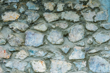background  stone walls of an ancient monastery close up