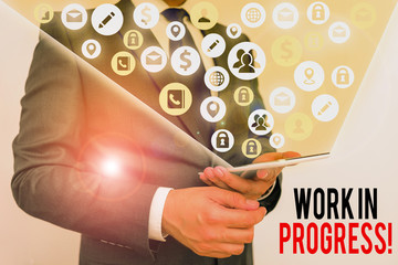 Text sign showing Work In Progress. Business photo showcasing unfinished project that still added...