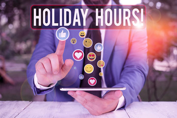 Writing note showing Holiday Hours. Business concept for Overtime work on for employees under...