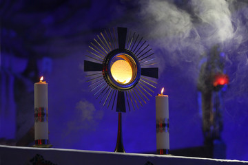 The ceremony of raising Monstrance in the church during the holidays - obrazy, fototapety, plakaty
