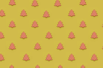 Christmas trees pattern on blue background.