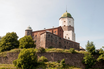 Fototapeta na wymiar Old medieval stone castle in the Leningrad region the city of Vyborg.