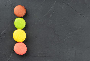Four multicolored macaroons
