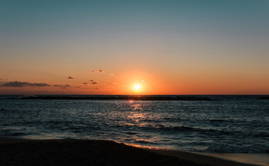 dark sunset over the ocean sea beach