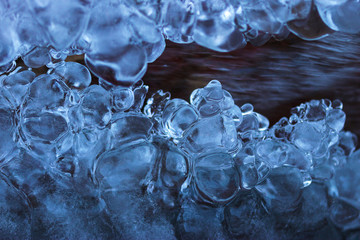 Ice crystals abstract texture. Blue ice bubble macro