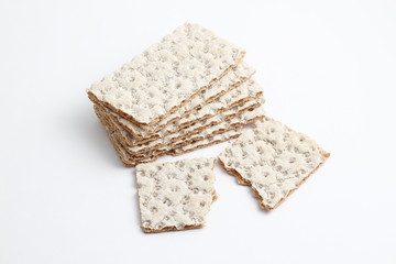 Isolated rye, wheat crisp bread on a white background.