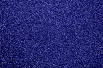 metal surface background with water drops.  phantom blue color toned abstract surface, copy space, text place. 2020 trendy color