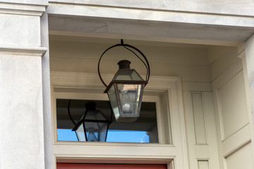 Close up detail of a lamp and its reflection in the historic district of Charleston, South Carolina.