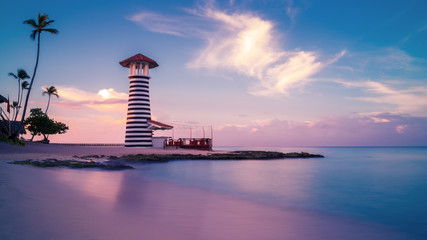 Sunrise at Bayahibe beach with smooth water, La Romana, Dominican republic