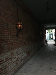 Gated Walkway With Gas Wall Sconces